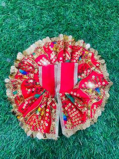 Very pretty red laddu Gopal poshak with sequins work  Quality guaranteed  Available for  Size 4 - dress diameter is 8 inches  Size 3 - dress diameter is 7 inches  Size 1 - dress diameter is 5 inches  Matching Radha Krishna dresses are also available. Please check Radha Krishna section  From land of Krishna, Mathura Red Sequined Sets For Navratri, Festive Red Set With Dori Work, Traditional Red Sets With Mirror Work, Sequin Traditional Wear For Diwali Celebration, Red Sets With Mirror Work For Festivals, Red Festival Sets With Mirror Work, Red Sharara With Mirror Work For Party, Diwali Celebration Traditional Wear With Sequins, Sequin Traditional Wear For Navratri Celebration