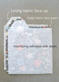 an adhesivee side down with instructions for fabric face up