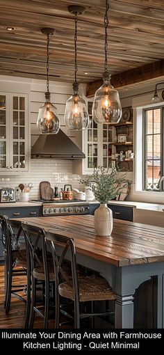 an image of a kitchen setting with lights hanging from the ceiling