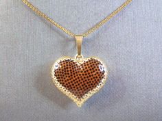 "FOR SALE IS THIS VINTAGE 14K YELLOW GOLD FINE BOX LINK NECKLACE WITH A GOLD HEART PENDANT. THE TOTAL WEIGHT IS 6.4g. THE NECKLACE MEASURES 20\" LONG FROM THE CLASP. THE HEART PENDANT MEASURES 1 1/4\" LONG BY 7/8\" WIDE. MAKES A GREAT GIFT FOR THAT SPECIAL SOMEONE. ANY QUESTIONS, PLEASE ASK. BE SURE TO CHECK OUT SOME OF OUR OTHER GREAT ITEMS. THANK YOU." Collectible 14k Gold Heart-shaped Jewelry, Antique Yellow Gold Necklaces For Valentine's Day, Collectible Heart Cut Gold Jewelry, Gold Heart Cut Collectible Jewelry, Collectible Gold Heart Pendant Jewelry, Collectible Fine Gold Necklace, Gold Fine Jewelry Necklace Collectible, Gold Fine Jewelry Necklace For Collectors, Gold Jewelry For Valentine's Day Collectible