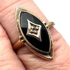 A Vintage 10k Yellow Gold Ring, Size 5.5, Featuring A Stunning Black Onyx Stone And A Diamond Chip. This Elegant Piece Weighs 2.2 Grams And Is Perfect For Adding A Touch Of Classic Glamour To Any Outfit. Vintage Style Made From 10k Yellow Gold Features A Black Onyx Stone Embellished With A Diamond Chip Ring Size Is 5.5 Weighs 2.2 Grams Vintage And Or Estate Jewelry Items. These Items Are Preowned Items And May Have Been Previously Worn. These Jewelry Items Come From Estate Sales, Auctions, Antiq Vintage Onyx Gemstone Jewelry, Antique Black Onyx Ring, Black Onyx Jewelry Vintage, Vintage Yellow Gold Onyx Rings, Vintage Onyx Ring 1stdibs, Black Onyx Stone, Onyx Stone, 10k Gold, Fine Silver