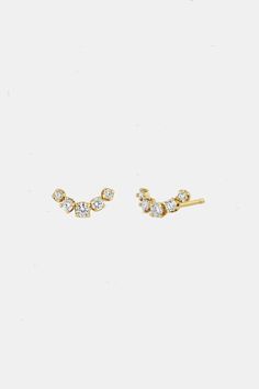 14k gold stud earrings with a flat curved bar of five prong set round diamonds in graduating sizes earring is approx. 8.7mm x 4.3mm (small) • round diamonds range from approx. 1.3mm - 2mm (small) • white diamonds .18 ctw (pair - small)• sold as a pair Hypoallergenic Dainty Round Cut Diamond Earrings, Minimalist 14k Gold Round Cut Diamond Earrings, Dainty 14k Gold Diamond Earrings With Prong Setting, Fine Diamond Earrings With Screw Back, Minimalist Round-cut Prong-set Earrings, Zoe Chicco, Curved Bar, Bar Studs, Blue Flats