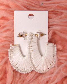 These fun raffia hoops are the perfect statement making earrings to wear all summer. Post back Raffia FINAL SALE - CANNOT BE RETURNED OR EXCHANGED Bead Earring, Making Earrings, White Heart, Heart Shape, Beaded Earrings, Final Sale, Heart Shapes, Beads, White