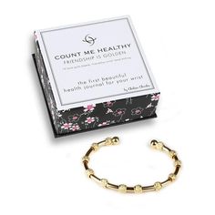 They say friends are the best motivation. Count Me Healthy Friendship Bracelet features 14k gold dipped beads with Friendship Infinity Circle etching. Includes a friendship paper insert. Created to serve as a beautiful journal for your wrist and a stylish way to be mindful. Count goals (suggestions below) by moving the beads one-at-a-time. Beads stay in place unless moved by you. Product details - 14k gold dipped- Twelve 6mm hand-etched infinity circle patterned beads- 7.5" adjustable cuff Thing Golden Bracelet, Good Motivation, Beautiful Journals, Wine Cocktails, Golden Rose, Golf Gifts, Gold Dipped, Circle Pattern, Etching