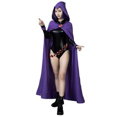 a woman in a purple cape and black bodysuit is standing with her hands out