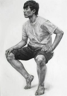 a drawing of a man sitting on the ground