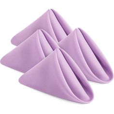 three purple napkins sitting on top of each other