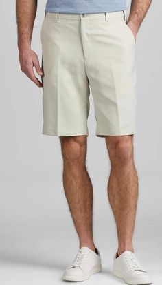 These performance shorts from the Traveler Collection were made for warm-weather fun. The fabric features a special finish that resists stains (great for backyard bbqs) while keeping wrinkles to a minimum. Adjustable waistband. Tailored Fit. Flat front. 100% polyester. 10" inseam. Machine washable. Imported. * 100% POLYESTER * TAILORED * IMPORTED FROM VIETNAM * ADJUSTABLE WAISTBAND White Golf Bottoms For Summer, White Summer Golf Bottoms, Spring Golf Bottoms With Built-in Shorts, Casual Spring Golf Bottoms, Summer Sports Bermuda Shorts, Fitted Golf Shorts For Spring, Solid Golf Bottoms With Built-in Shorts, Golf Bottoms With Built-in Shorts, Spring Bermuda Athletic Shorts With Built-in Shorts