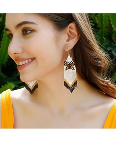 Get 10% off now! Buy original resort style handmade beaded butterfly earrings at cheap price online. Free stable shipping and pro since 2009. Knitted Earrings, Tassels Handmade, Affordable Boho, Bohemian Holiday, Beaded Butterfly, Bead Knit, Design Butterfly, Diy Tassel, Estilo Boho Chic