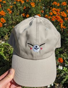 If you love Stray Kids and therefore Skzoo, this was made for you. Perhaps the CUTEST way to rep your bias in a subtle way. This is made from a 100% chino cotton twill white cap.  If you have more than one bias (which who doesn't), or want to match with someone else, I do have the whole skzoo collection up in my shop! Most members I have as both a cap and a bucket hat, so whatever you need, I have covered.  This product is made especially for you as soon as you place an order, which is why it takes us a bit longer to deliver it to you. Making products on demand instead of in bulk helps reduce overproduction, so thank you for making thoughtful purchasing decisions! Cute Baseball Cap With Embroidered Logo And Curved Brim, Cute Hats With Embroidered Logo And Curved Brim, Cute Baseball Cap With Embroidered Logo, Cute Adjustable Baseball Cap With Embroidered Logo, Cute Embroidered Adjustable Baseball Cap, Cute Dad Hat With Curved Brim, Stray Kids Fashion, Kpop Merchandise, Kids Fans