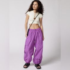 Brand New With Tags Purple Cargo Pants For Streetwear, Purple Streetwear Cargo Pants With Side Pockets, Purple Streetwear Cargo Pants, Purple High Waist Cargo Pants, Casual Purple Parachute Pants With Pockets, Casual High Waist Purple Cargo Pants, 90s Summer Parachute Pants With Cargo Pockets, 90s Parachute Pants With Pockets For Spring, 90s Style Spring Parachute Pants With Pockets