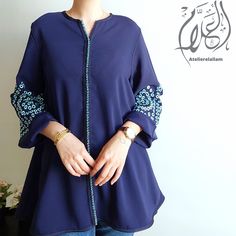 ◾Moroccan tunic casual and boho style in silk crepe, embroidered Terz lmsewess "perforated embroidery" style worked in dfira and âakad, Available in two versions: Version 1: Fabric in navy blue and embroidery in turquoise. Version 2: Fabric in navy blue and embroidery in navy blue (tone on tone). both versions available in size S-M (can be worn by size S and M).  ◾This tunic is ideal for an evening or a family event, Ramadan or to wear on the day of Aid, it goes wonderfully with slim jeans, flare up jeans, leggings...  ◾It can be worn casual for every day with sneakers, or with pumps or heeled sandals for a more refined style. DELIVERY TIME: 2-5 days via FedEX 📸 PICTURES Listing photos are taken in natural light. Depending on your screen definition, colors may vary. Navy Blue Shirts, Jean Flare, Eid Al Fitr, Boho Tunics, Family Event, Womens Tunics, Boho Stil, Ramadan, Style Casual