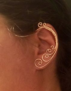 Bound to be Swirls, Vine earring, Jewelry, Ear Cuff, Vine Jewelry, ear jewelry, ear climber, ear wrap, ear jacket, non pierced by WickedlyWired on Etsy https://www.etsy.com/listing/556666014/bound-to-be-swirls-vine-earring-jewelry Elegant Adjustable Wire Wrapped Ear Climbers, Elegant Gold Wire Wrapped Cartilage Earrings, Elegant Gold Wire-wrapped Ear Cuff, Elegant Gold Wire Wrapped Ear Cuff, Elegant Spiral Ear Cuff, Elegant Wire Wrapped Cartilage Earrings For Gift, Elegant Adjustable Spiral Wrap Earrings, Elegant Spiral Single Ear Cuff, Elegant Spiral Shaped Single Ear Cuff