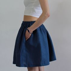 "Write the selected color in the message Midi linen women skirt Handmade blue linen skirt with 2 pockets , perfect for casual wear and suitable for any occasion in any season Details: - 100% natural linen produced in Europe ; - medium weight (180 gram per square meter); - color: blue, could be any from our 17 available colors (color samples at the photo); Made to order, approximately 3-5 days, If you have any questions please message me and I will be glad to answer. Size guide : Size XS Bust: fi Summer Full Skirt With Pockets, Summer Full Skirt Bottoms With Pockets, Summer Bottoms With Pockets And Full Skirt, Casual Flared Linen Skirt, Spring Knee-length Mini Skirt With Pockets, Relaxed Linen Mini Skirt, Casual Linen Full Skirt, Linen Skirted Bottoms With Pockets, Casual Full Linen Skirt