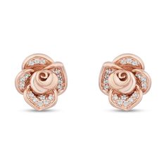 Perfect your everyday look with romantic detail when you wear these sweet diamond rose stud earrings from the Enchanted Disney Fine Jewelry Collection inspired by Belle. Crafted in precious 10K rose gold Each earring showcases a beautifully sculpted rose shimmering with diamonds along the outer petals. Captivating with 1/6 ct. t.w. of diamonds These post earrings secure comfortably with friction backs. ©Disney Enchanted Disney, Enchanted Disney Fine Jewelry, Disney Belle, Disney Fine Jewelry, Rose Stud Earrings, Belle Disney, Fine Jewelry Collection, Everyday Look, Post Earrings