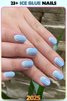 Ice blue nails with glossy stripes, offering a clean and modern look. The subtle contrast makes it a great choice for those who appreciate simple designs.