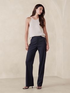 Crafted from our signature luxurious lightweight wool, this straight pant uses a bit of stretch for all-day comfort and has a longer inseam to wear with your favorite heels.  A high waist and straight leg adds length to every step.  Breathable, Wrinkle-Resistant.  High Rise Straight Fit: Slim hip and thigh, with a straight, stovepipe-style fit through the leg.   Extra long - so you can wear them with heels.  Responsible Wool Standard Certified : This global standard protects the sheep that suppl Fitted Navy Straight Dress Pants, Sleek Straight Dress Pants With 4-way Stretch, Sleek Straight Pants With 4-way Stretch, Solid 4-way Stretch Straight Leg Dress Pants, Blue 4-way Stretch Straight Leg Pants, Sheep Fabric, Slim Hips, Professional Work Outfit, Petite Shorts