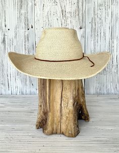 Reata style hat with rust shade suede lace band. 4" brim, 5.75" crown. Pick your size. Pick your size Western Flat Bill Hat For The Beach, Summer Straw Hat With Flat Bill For Ranch, Western Flat Bill Hat For Beach, Western Sun Hat With Flat Bill For Vacation, Western Style Flat Bill Sun Hat For Vacation, Fitted Straw Hat With Flat Bill For Vacation, Adjustable Flat Bill Sun Hat For Kentucky Derby, Flat Bill Hats For Ranch In Summer, Adjustable Natural Flat Bill Hat