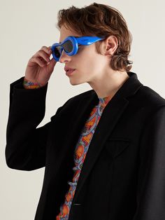 Loewe often experiments with different shapes and proportions, like the inflated acetate frames on these sunglasses. Made in Italy, they have dark-grey lenses and the brand's logo stamped along the arms. Modern Blue Acetate Sunglasses, Inflated Sunglasses, Kong Movie, Round Eyewear, Summer Sunglasses, Acetate Sunglasses, Sunglasses For Men, Short Suit, Fine Jewelry Designers