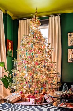 a decorated christmas tree in a living room