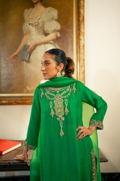 3 piece suit comes with matching pants, and dupatta. Shirt length: 45 inches The shirt and pants are made of pure raw silk and the dupatta is organza. This item includes the following handwork: aari, kora, and zardozi with pearls, sequins, and resham thread. This outfit including the sleeves is not see through. Orders cannot be changed or cancelled after 30 minutes of completion of the order. We do not offer returns or exchanges on this item. We cannot make any exceptions to this policy since th Semi-stitched Silk Sets With Dabka Detailing, Festive Raw Silk Lawn Suit With Traditional Drape, Traditional Chinon Lawn Suit With Resham Embroidery, Elegant Lawn Suit With Dabka For Festivals, Elegant Naqshi Sharara For Festivals, Elegant Lawn Suit With Dabka Detail For Transitional Season, Designer Raw Silk Lawn Suit For Eid, Elegant Fitted Sharara With Naqshi Details, Designer Raw Silk Lawn Suit With Resham Embroidery