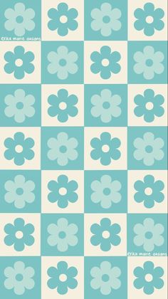 a blue and white checkerboard pattern with flowers on the bottom, in different colors