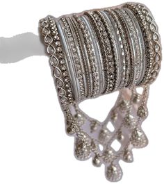 Silver Fusion Style Bangle For Festive Occasions, Silver Festive Fusion Bangle, Silver Fusion Bangle For Festive Occasions, Festive Silver Bracelets With Latkans, Bollywood Style Silver Bangle Bracelet, Silver Fusion Bangle For Party, Silver Bracelet With Latkans In Metal, Silver Metal Bracelets With Latkans, Silver Stackable Bangle For Festive Occasions