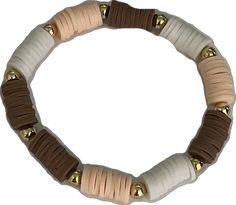 Casual Everyday Brown Stretch Bracelet, Casual Brown Stretch Bracelet For Everyday, Casual Brown Stretch Bracelet For Everyday Wear, Earthy Brown Beaded Bracelets For Beach, Adjustable Beige Stretch Bracelet, Brown Heishi Beads Bracelets For Beach, Casual White Stretch Bracelet With Wooden Beads, Earthy Brown Bracelet For Beach, Earthy Brown Bracelets For Beach