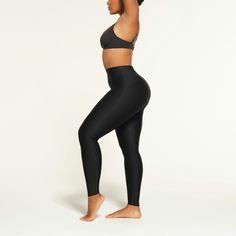 This shaping solution offers a higher rise and mid-level compression for a smooth look that’s perfect under clothing or stand-alone. Features raw edges ... Shapewear Shorts, Under Clothing, Leggings Shop, Feel Confident, Shapewear, Onyx, Lounge Wear, Shop Now, Leggings