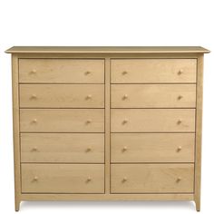 a wooden dresser with many drawers and knobs on the top drawer, against a white background