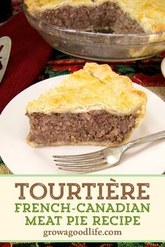 a piece of meat pie on a plate with a fork next to it and the text tourtiere french - canadian meat pie recipe