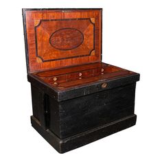 an antique wooden chest with leather linings