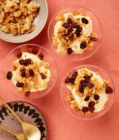 four desserts in small glass bowls on a table