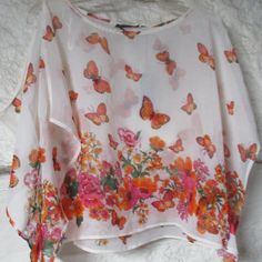 Dex Sheer Cropped Butterfly And Flowers Top W/ Split Sleeves Size S 22" Across Chest 19" Shoulder To Hem Gorgeous Colors, A Truly Beautiful Top! Multicolor Butterfly Print Top For Summer, Multicolor Butterfly Print Tops For Summer, Casual Summer Blouse With Butterfly Print, White Butterfly Print Top For Summer, White Butterfly Print Tops For Summer, White Butterfly Print Summer Tops, Pink Top For Spring Beach Outing, Spring Beach Pink Top, Sleeveless Summer Tops With Butterfly Print