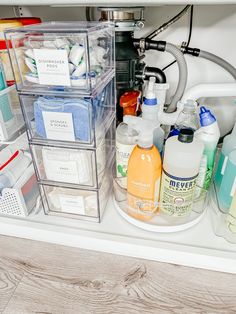 an organized bathroom drawer with soaps, shampoos and other personal care items