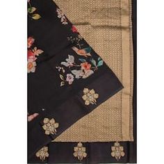 Add a touch of elegance to your wardrobe with our Banarasi Silk Katan Floral Printed Black Saree. The body features a beautiful floral print, while the self satin medium border is adorned with gold zari floral motifs. The pallu boasts a stunning gold zari brocade design. Complete with a self plain gold zari butta blouse with satin borders, this saree is perfect for any occasion. Body Features, Floral Motifs