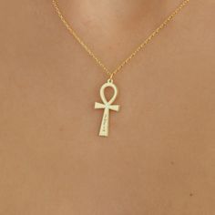 Personalized Ankh Pendant Necklace. Christmas Gift, 8k Solid Gold, 14k Solid Gold, 18k Solid Gold Ankh Necklace, Ankh Pendant, Gifts for Her, Ancient Necklace, Egyptian Necklace, Antique Necklace, Ankh Jewelry, Gift for Friend, Name Necklace The ancient Egyptian symbol Ankh, also known as the "Key of the Nile," the "Cross of Life," literally means life. Symbolically, on the other hand, it symbolizes the unity of men and women. It represents the sun, rebirth, and intuitive powers. At the same tim Symbolic Brass Jewelry For Anniversary, Traditional Adjustable Cross Jewelry, Gold Brass Cross Jewelry, Symbolic Brass Cross Jewelry, Handmade 14k Gold Spiritual Necklace, Spiritual Handmade Cross Pendant Jewelry, Symbolic Hallmarked Jewelry For Ceremonial Occasions, Handmade Spiritual Cross Pendant Jewelry, Symbolic Etched Jewelry For Ceremonial Occasions