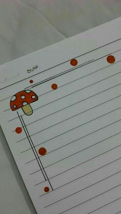 a piece of lined paper with an image of a mushroom on it