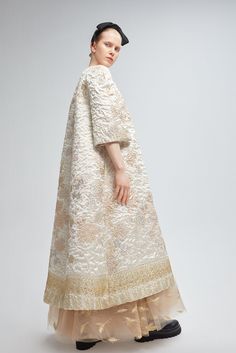 Description Gold A-line, Long dress Loose, Three-quarter sleeves Open neckline Brocade, Tulle, Lace Dry Clean Made in Spain SKU 21-12/21-08 Luxury Brocade Dress With Sheer Dupatta, Elegant Festive Dress With 3/4 Sleeves, Elegant 3/4 Sleeve Festive Dress, White 3/4 Sleeve Evening Dress, Spring Half Sleeve Midi Dress For Wedding, Half Sleeve Midi Dress For Spring Wedding, Spring Wedding Midi Dress With Half Sleeves, Elegant Beige Half Sleeve Dress, Spring Wedding Half Sleeve Midi Dress