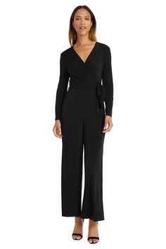 Meet Prudence, versatile wrap jumpsuit crafted from soft, stretchy jersey. This elegant one-piece features a flattering V-neckline, long sleeves, and wide-leg pants. Perfect for office wear, evening events, or travel. The self-tie waist ensures a custom fit for all body types. Easily dressed up with heels and statement jewelry or down with flats for casual outings.