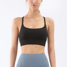 The EMES SHOP bra is detailed with a scoop neckline. Features a doublethin straps. and crosses over in the back. This buttery soft. light-weight. breathable sports bra tank is perfect for your next yoga class. morning run. afternoon hike. or trip to the gym.MATERIAL:73% Nylon 27% SpandexMEASUREMENTS:Small : 4-6 Waist: 25-26.5 in Chest: 33-34.5 inMedium : 6-8 Waist: 26.5-28 in Chest: 34.5-36 inLarge : 8-10 Waist: 28-29.5 in Chest: 36-37.5 inX-Large : 10-12 Waist: 29.5-31 in Chest: 37.5-39 in Running Sports Bra, Yoga Tights, Morning Run, Sports Bra Top, Gym Clothes Women, Bra Tank, Yoga Activewear, Activewear Sets, Casual Vest