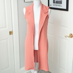 Boohoo Peach Sleeveless Longline Vest. New Without Tags! Never Worn. From The Online Website Boohoo. Color: Peach. Size Small. Fitted Pink Sweater Vest For Summer, Sleeveless Stretch Sweater Vest For Day Out, Stretch Sleeveless Sweater Vest For Day Out, Peach Sleeveless Tank Top For Spring, Pink Sleeveless Sweater Vest For Spring, Pink Sleeveless Sweater Vest For Summer, Sleeveless Pink Sweater Vest For Summer, Affordable Peach Sleeveless Top, Chic Peach Sleeveless Tank Top