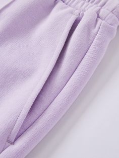 Details: The soft pink and purple tone sweatpants are as healing and beautiful as being in a sea of lavender flowers. Loose straight fit Elasticated waistband and drawstring, side work pockets Materials & Care: Cotton 51.2 %Polyester 48.8% Hand wash | Dry clean Do not bleach Size & Fit: Model is 5'7", Bust 32, Waist 24, Hips 35, wearing a size S Item #: JN1PA17 Lavender Bottoms With Elastic Waistband For Spring, Lavender Wide Leg Cotton Bottoms, Lavender Pants For Spring Loungewear, Lavender Cotton Bottoms With Pockets, Spring Lavender Loungewear Pants, Spring Lavender Lounge Pants, Relaxed Fit Lavender Bottoms With Pockets, Relaxed Fit Lavender Cotton Bottoms, Lavender Cotton Bottoms With Elastic Waistband