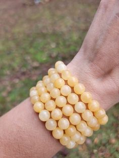 These yellow calicite bracelets are a sunny color and each come with beads that are 8mm in diameter. If you need a custom size, please let me know. Yellow Stretch Bracelet With 8mm Beads, Bracelet Thick, Yellow Bracelet, Yellow Calcite, Hair Idea, May 21, Crystal Bracelet, Crystal Bracelets, Beaded Bracelet