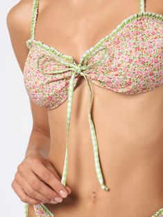 Top bralette swimsuitLiberty fabric with flower printComposition: 100% cottonMade with Liberty fabric Spring Swimwear With Adjustable Straps And Underwire, Cotton Swimwear For Sunbathing In Spring, Feminine Spring Swimwear With Adjustable Straps, Feminine Swimwear With Adjustable Straps For Spring, Feminine Floral Print Swimwear For Sunbathing, Feminine Fitted Floral Print Swimwear, Fitted Floral Print Feminine Swimwear, Feminine Underwire Swimwear For Summer, Spring Swimwear With Adjustable Straps