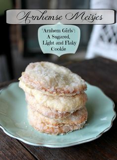 three cookies stacked on top of each other on a plate with the words, arthemem girls'a sugared light and play cookie