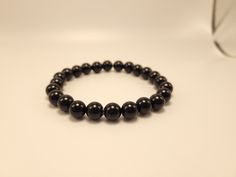 High Quality beautiful black Onyx bracelet made with 8mm beads. Onyx is known as a major protector and grounding crystal. The deep black goes with anything and strengthens your ability to focus and stay grounded. All bracelets are stretchy and made to fit you perfectly! Black Onyx Bracelet, Black Bracelet, Wire Wrapped Bracelet, Bracelet Crystal, Onyx Bracelet, Free Bracelet, Black Bracelets, Crystal Bracelet, Crystal Bracelets