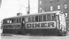 an old black and white photo of a train car with the word dominion on it