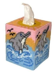 a tissue dispenser with an elephant on it