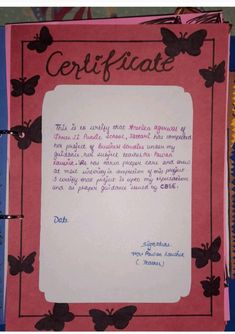 a pink and blue book with butterflies on it's front cover that says, certificate